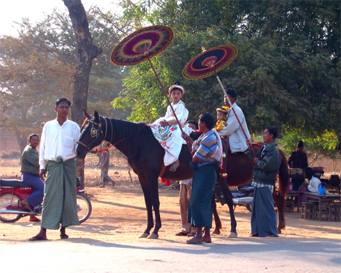 In Myanmar, a family celebrates a young boy's becoming a noviate monk.