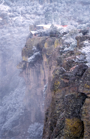 A light snow paints Mexico's Copper Canyon in holiday colors.