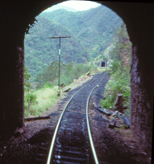 El Chepe train exiting one of the 86 tunnels it will pass through on it's way through Copper Canyon.