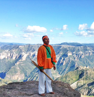 Tarahumara indian at one of the many beautiful Copper Canyon view points.