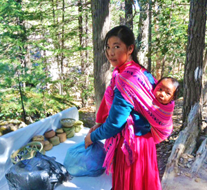 Tarahumara indian girl sells baskets in Copper Canyon