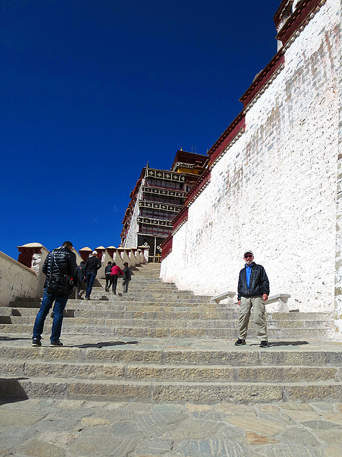 Lee Klein climbing the entrance steps to the palace.