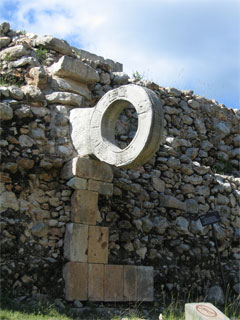 Stone vertical hoop in the ruins of a Mesoamerican ballfield.