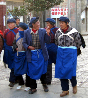 Naxi ladies stroll home in Li Jiang, China